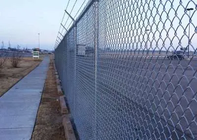 Tall Chain Link Fence - Barbed Wire