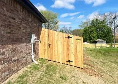 6 ft Cedar Dog Ear Privacy Fence with Walk Gate on E 32nd St S in Sand Springs, OK