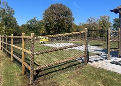5 ft Round Rail and Chain Link Fence with Ornamental Iron Fence on e canyon Ridge Rd, Owasso, OK