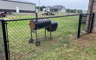 4 ft Black Chain Link Fence with 8 ft Double Gate on Hobbs Creek Dr in Collinsville, OK