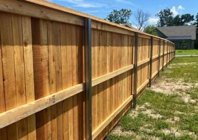 6 ft Cap and Trim Wood Vertical Privacy Fence